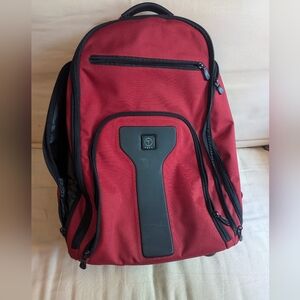 Tumi T-tech rolling backpack
